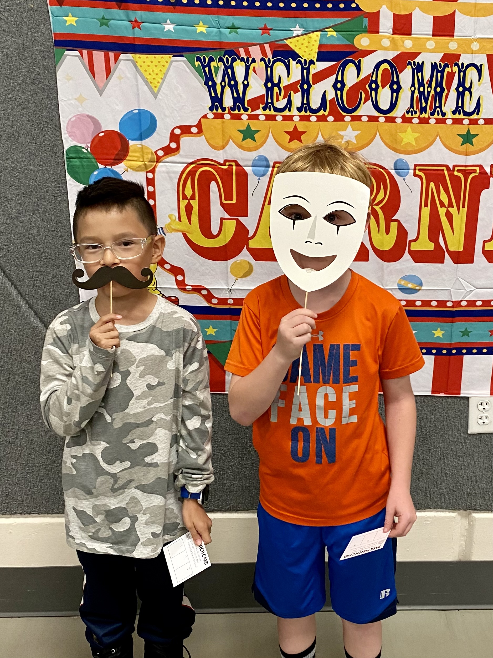 Two students with Circus props at Literacy Night