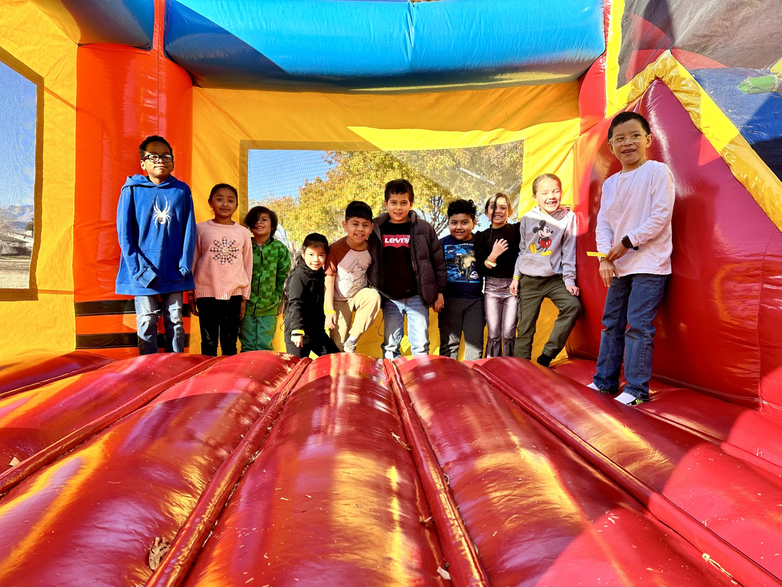 Student's from Ms. Bernal's class in the bounce house
