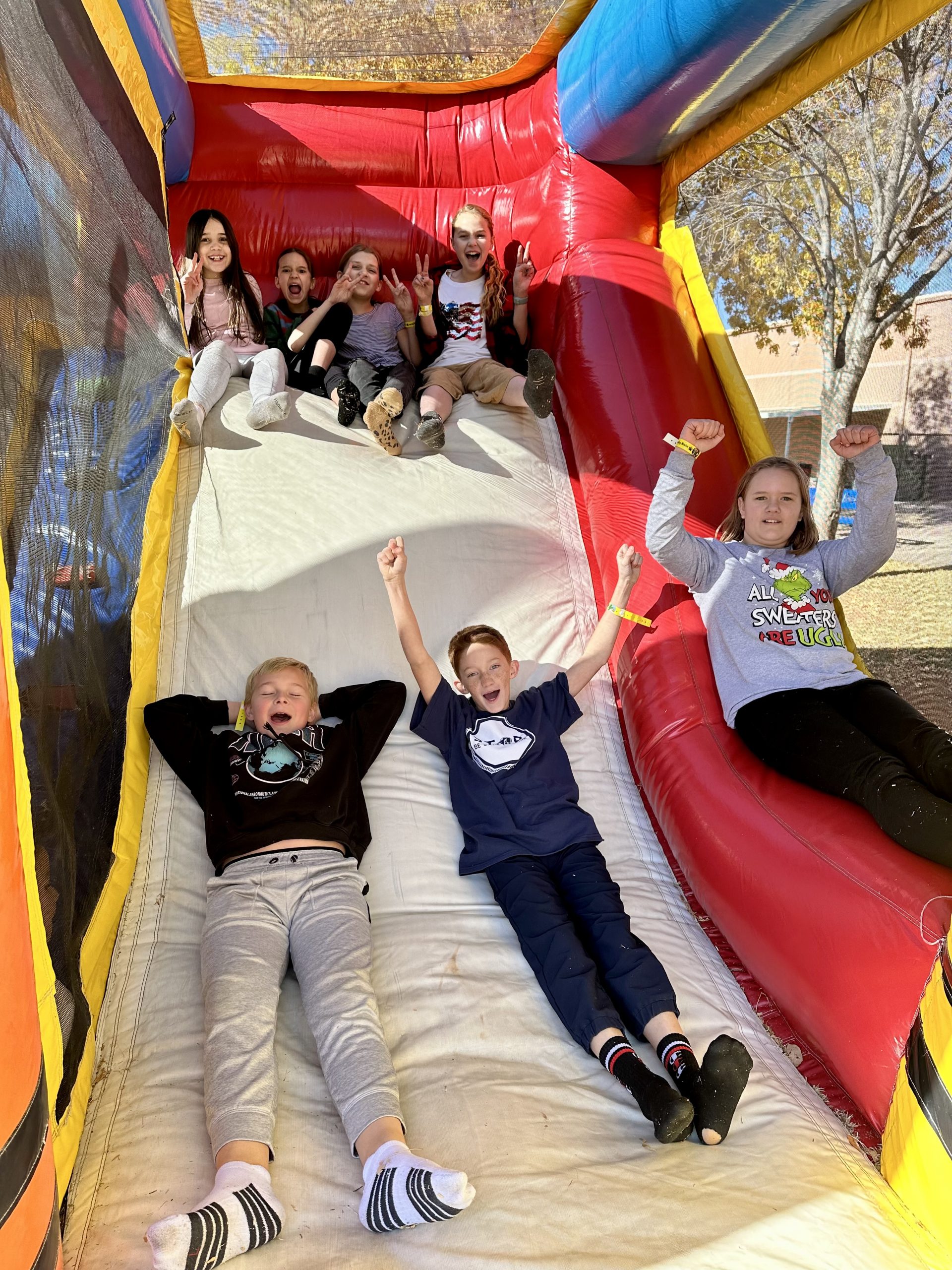 Student's from Mrs. Gonzalez's class in the Bounce House