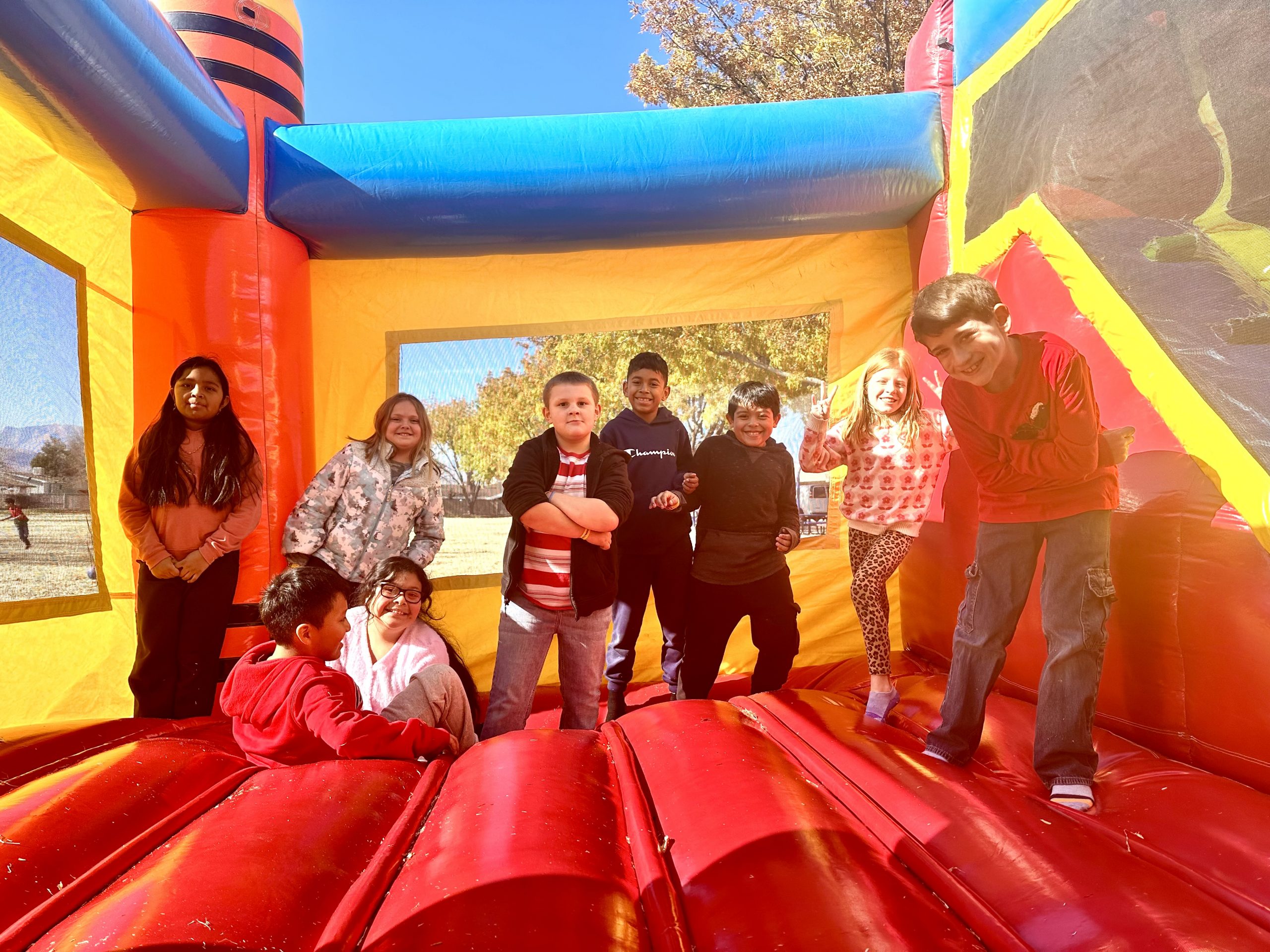 Students from Mrs. Dunleavy's class in the Bounce House